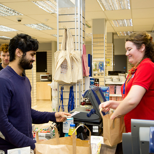 Person buying products at a cashier