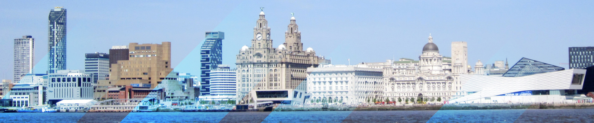 Liverpool city docs, with several buildings along the riverside